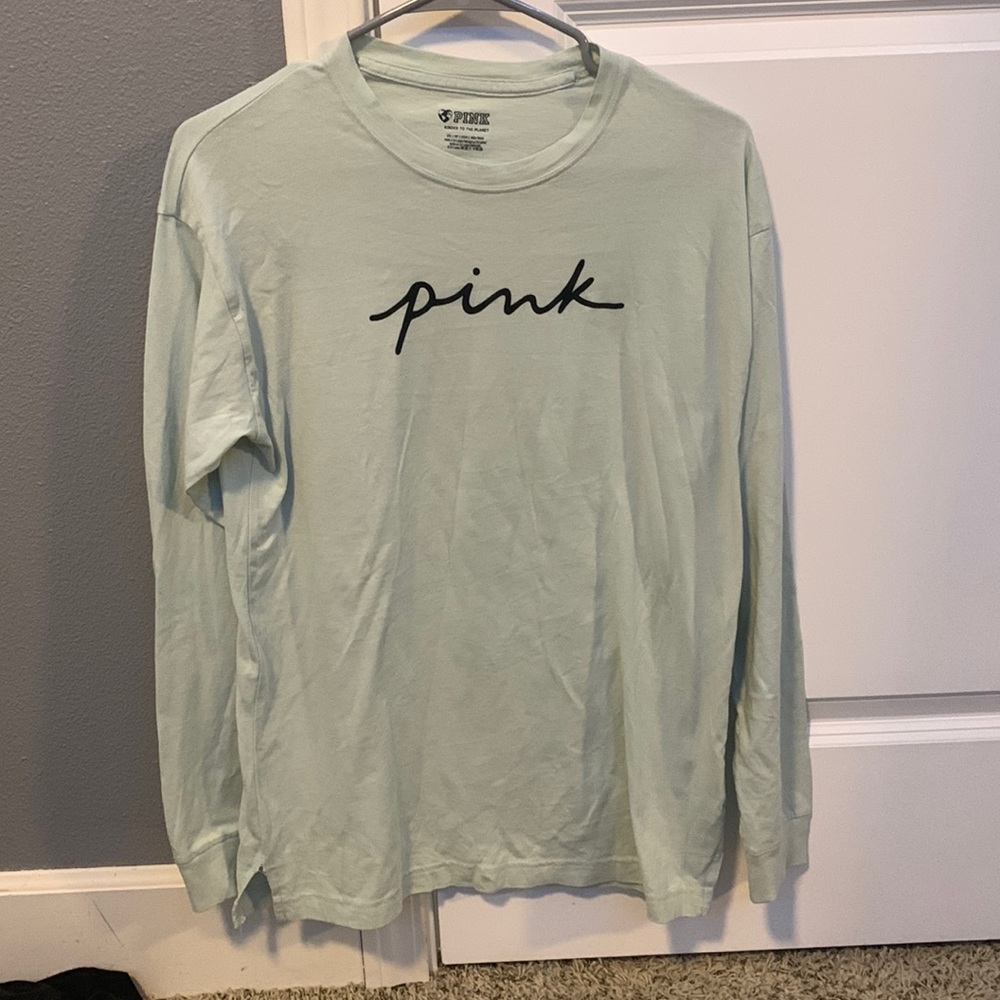 light green long sleeve PINK shirt.